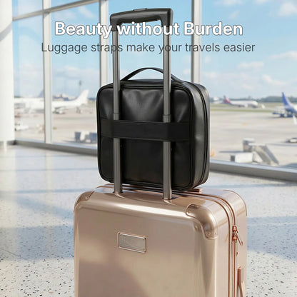 A back view of the black Sunday Status travel makeup bag, featuring a sturdy built-in luggage strap securely attached to the handle of a rose gold rolling suitcase in an airport setting, showcasing hands-free travel convenience