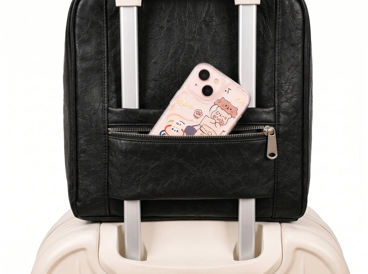 Rear trolley sleeve and zipped phone pocket on the Grand Vanity attached to luggage